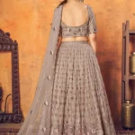 Dusty Net Thread With Sequence Embroidered Lehenga Choli