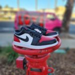 Nike Air Jordan Retro 1 Low Bred Toe 2.0 Sneakers