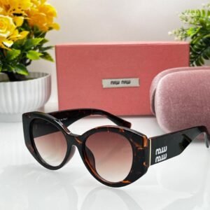 MIU MIU Sunglasses Black Unisex Model